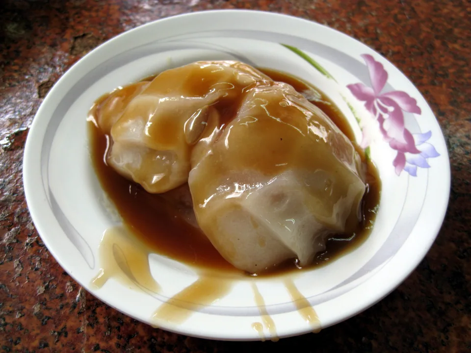 Translucent Changhua ba-wan with pork and bamboo filling under glossy sweet-savory sauce