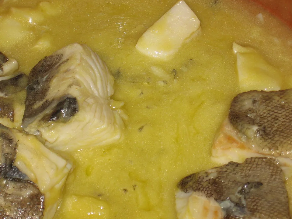 Basque salt cod in glossy pale-golden pil-pil sauce with garlic and chilli