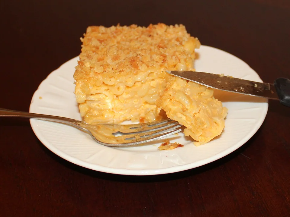 Baked macaroni and cheese with a golden crumb crust