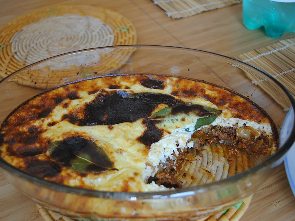 Cape Malay bobotie with golden egg custard, bay leaves, yellow rice and chutney