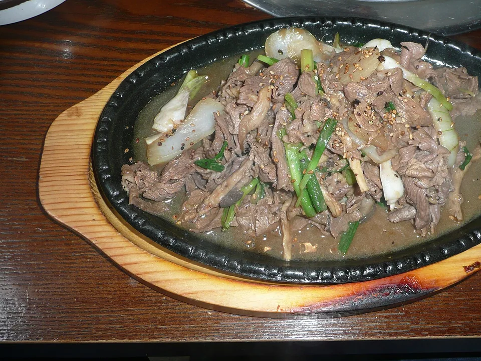 Cooked beef bulgogi with glossy onions and scallions