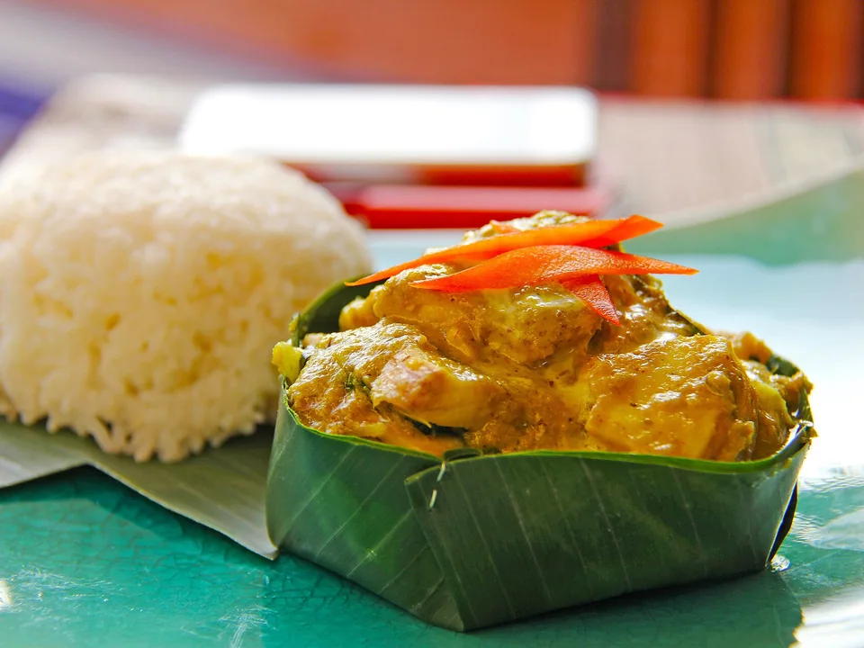 Cambodian fish amok custard steamed in banana-leaf cups with coconut and lime leaf