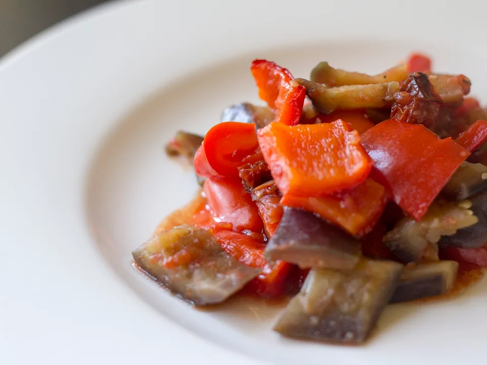 Sicilian caponata with browned eggplant, celery, green olives, capers and basil