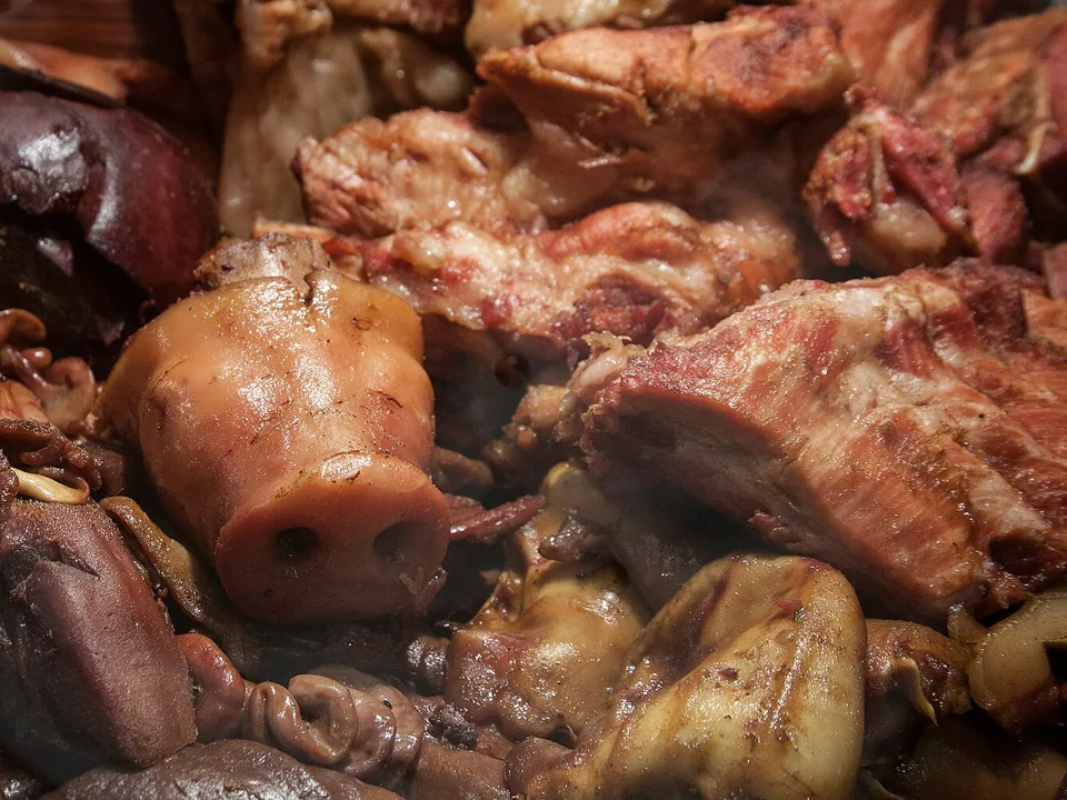 Michoacán-style carnitas with crisp bronze edges and juicy pork