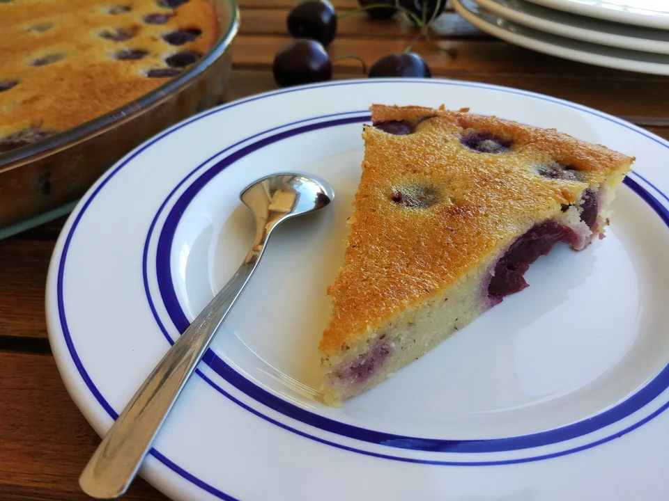 Cherry clafoutis with whole cherries in golden custard