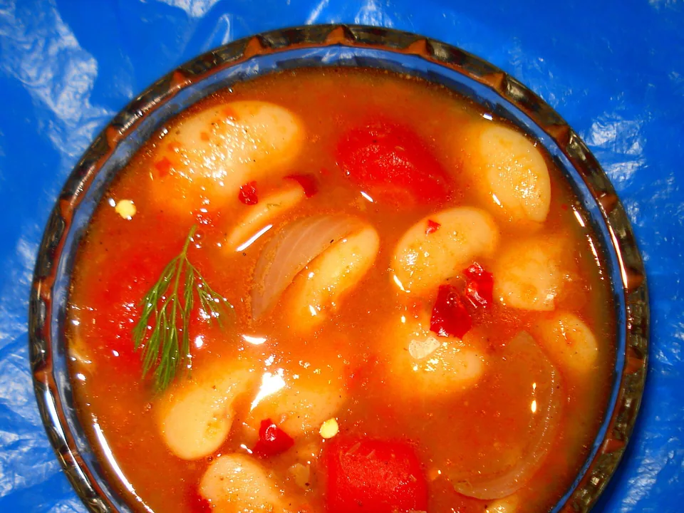 Greek fasolada white bean soup with tomato, carrot and celery