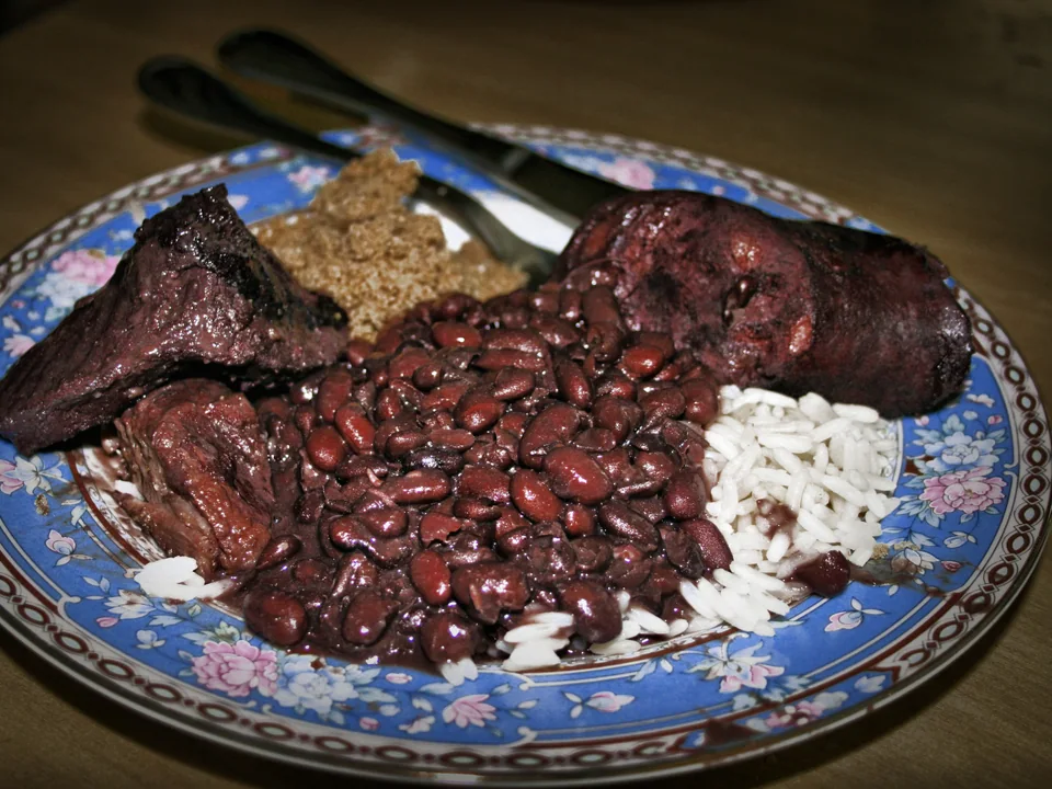 Feijoada with black beans, pork, sausage, rice and collard greens