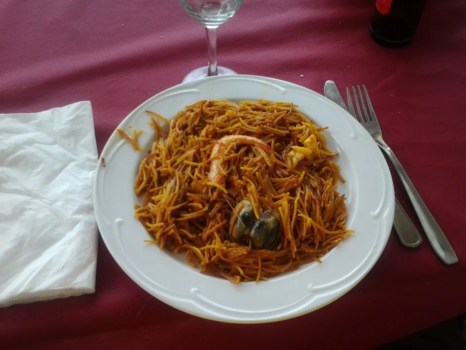 Valencian fideuà with short noodles, prawns, monkfish and cuttlefish