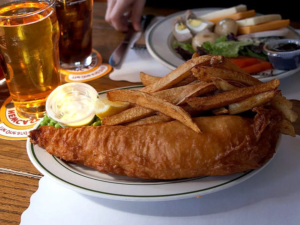 Golden British fish and chips with thick crisp chips