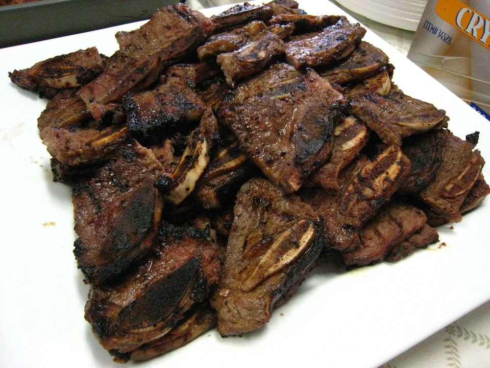 Caramelized Korean grilled beef short ribs cut across the bone