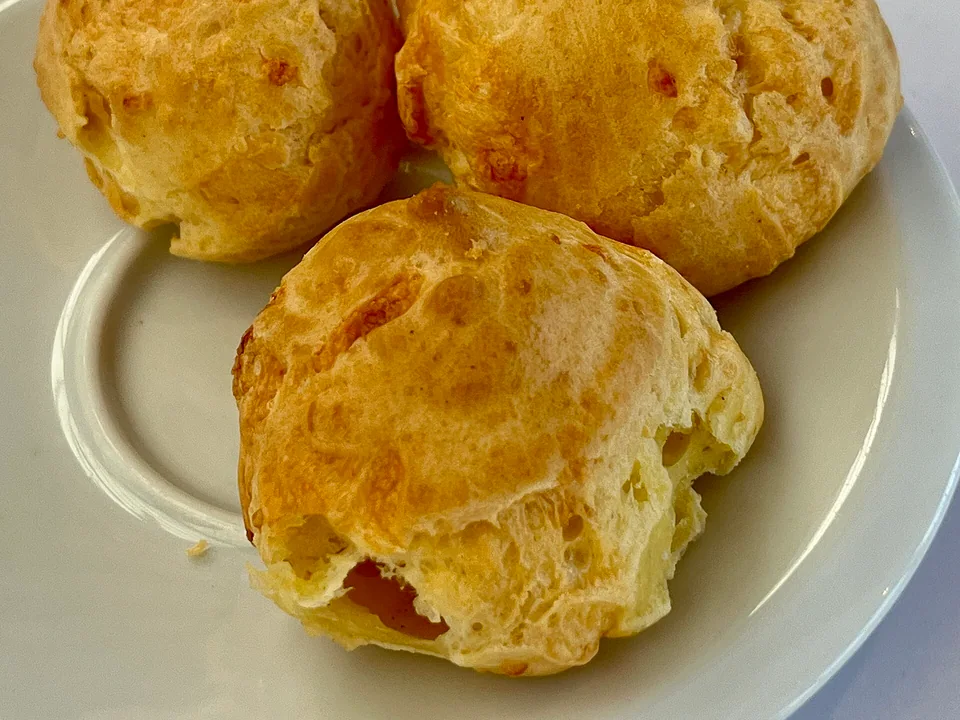 Golden French cheese puffs with crisp Gruyère tops