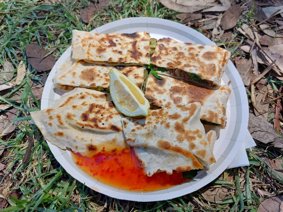 Turkish spinach and feta gözleme griddled until golden with crisp brown spots