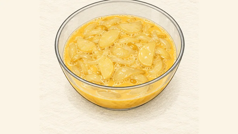 Tortilla Española, step 4: Mix with the eggs.