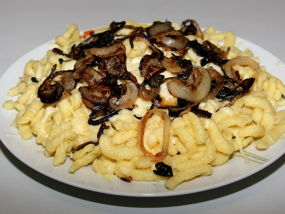 Cheesy German Käsespätzle with browned onions and chives