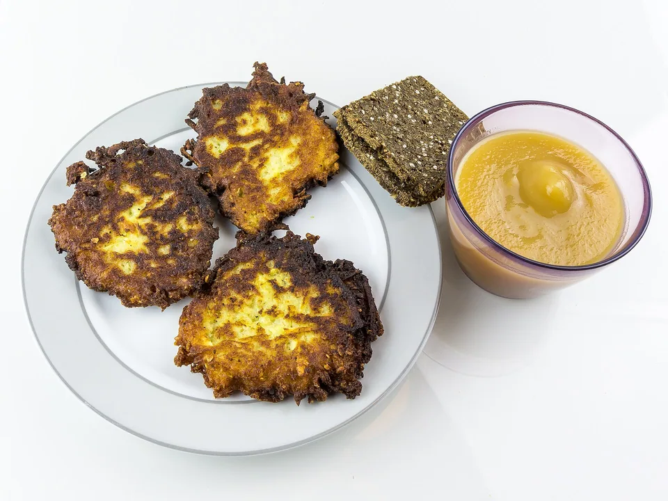 Crisp German Kartoffelpuffer potato pancakes with applesauce