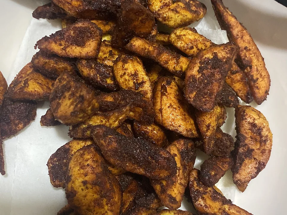 Ghanaian kelewele, caramelized ginger-and-chile plantain cubes served with roasted peanuts