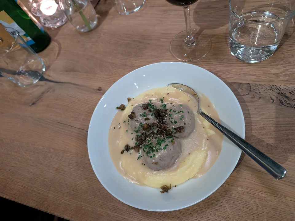 Königsberger Klopse meatballs in pale creamy caper sauce with potatoes