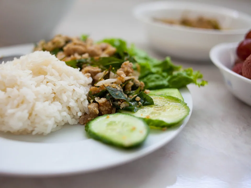 Lao chicken larb with toasted rice powder, mint, cilantro, lettuce and sticky rice