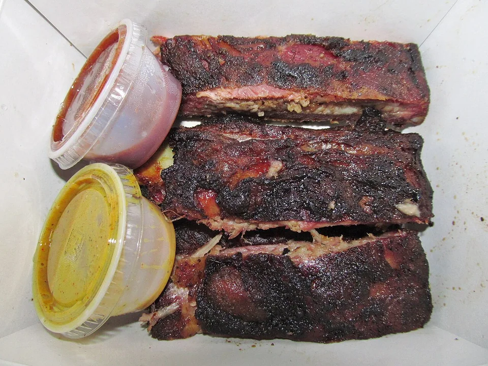 Memphis dry-rub pork ribs with a dark smoky spice crust