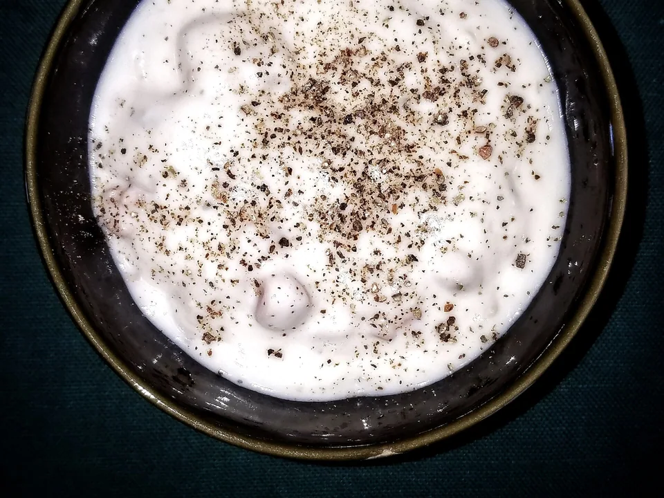Creamy New England clam chowder with potatoes, clams and bacon