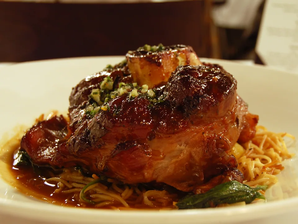 Braised ossobuco with central marrow bone and lemon-parsley gremolata