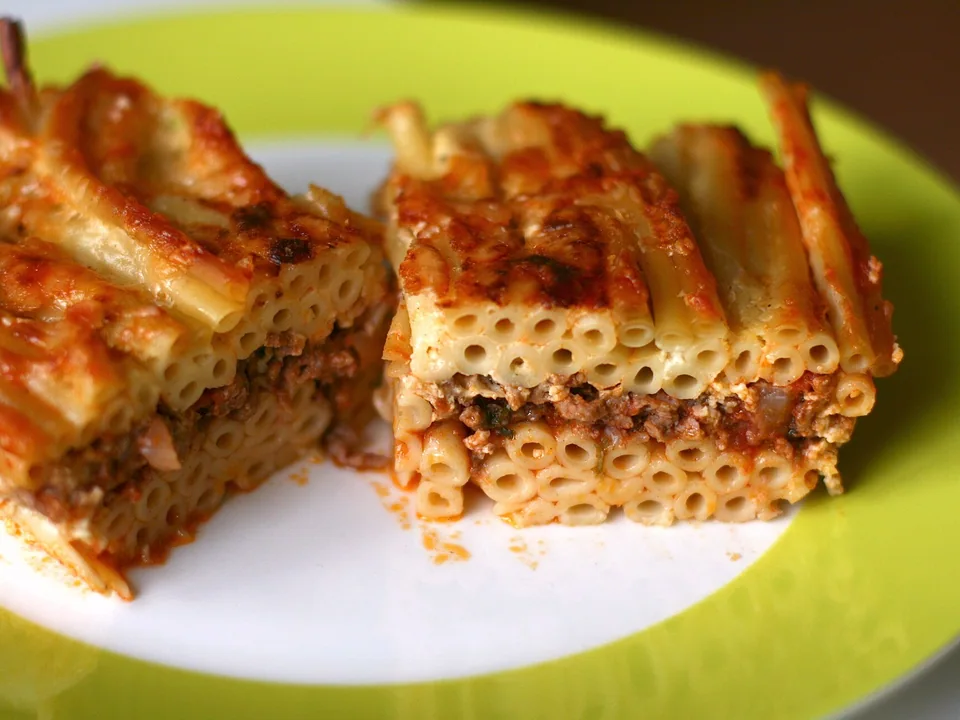 Greek pastitsio slice with tubular pasta, spiced beef and golden béchamel