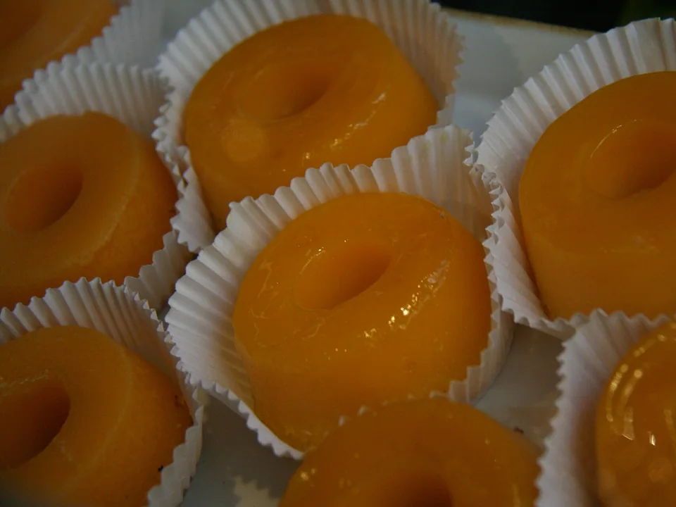 Glossy golden quindim coconut custard domes