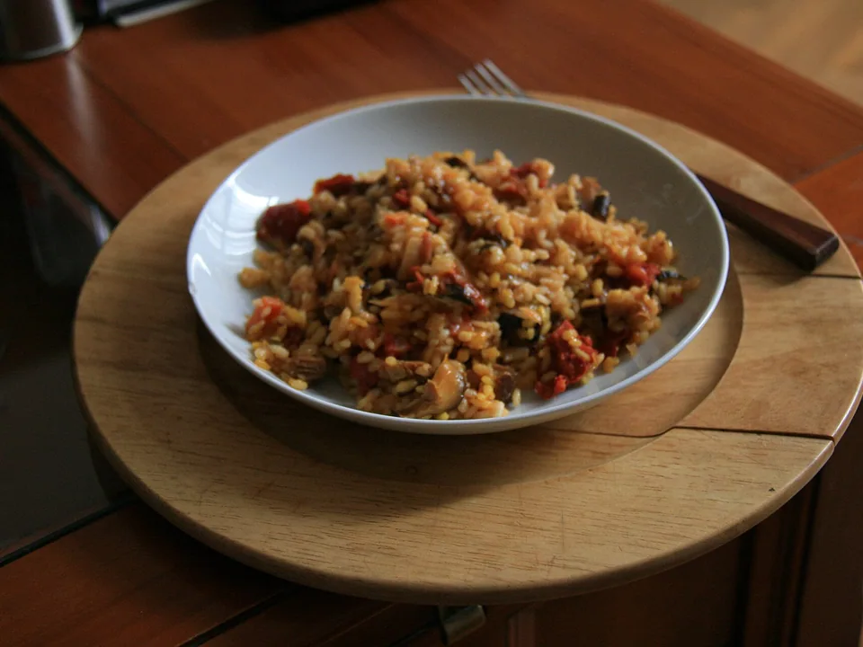 Golden saffron risotto with glossy flowing texture