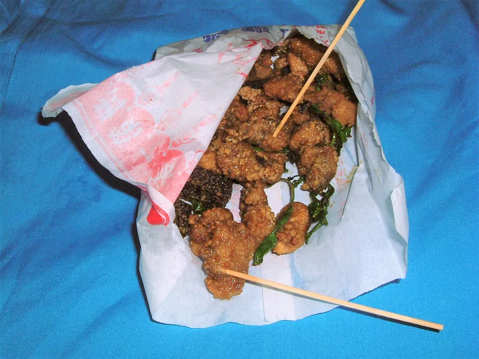 Craggy Taiwanese popcorn chicken with fried basil and white-pepper seasoning