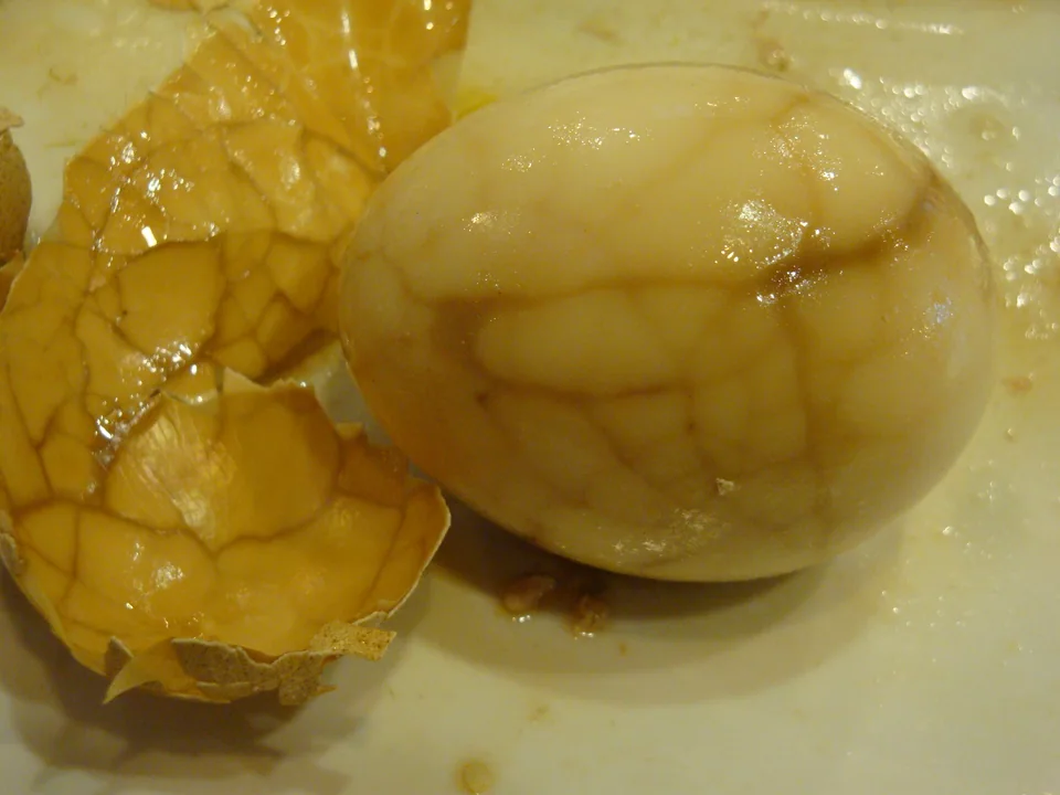 Peeled Taiwanese tea eggs with dark marbled tea-and-soy patterns